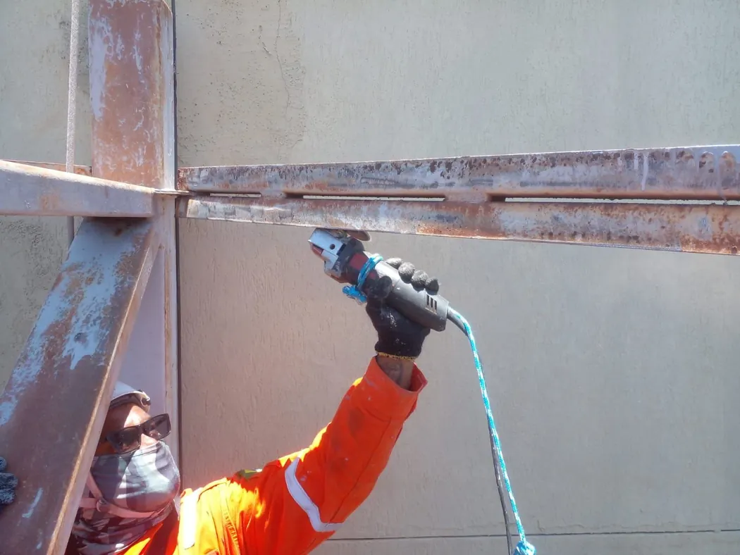 Team carrying out repairs on building structures